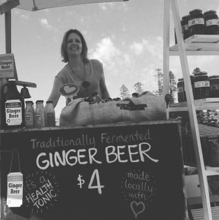Market stall holder selling Ginger Beer