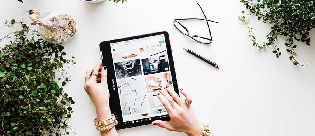 flat lay with an ipad and pot plants