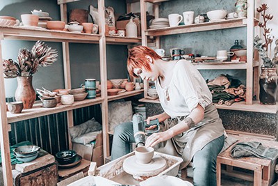 Pottery artist working in her workshop