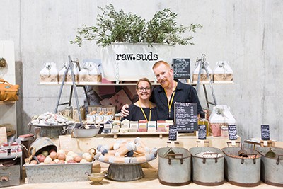 The owners of Raw Suds at their market stall