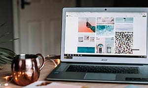 Laptop with Unsplash on the screen