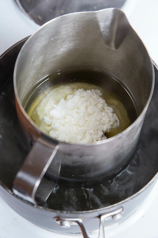 Melting wax flakes to make candles