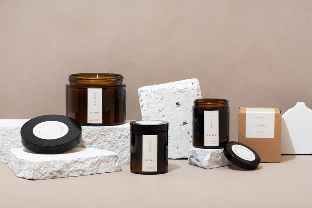 Product photography - candles in amber jars