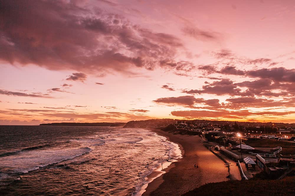 Landscape view of Newcastle beach at sunset